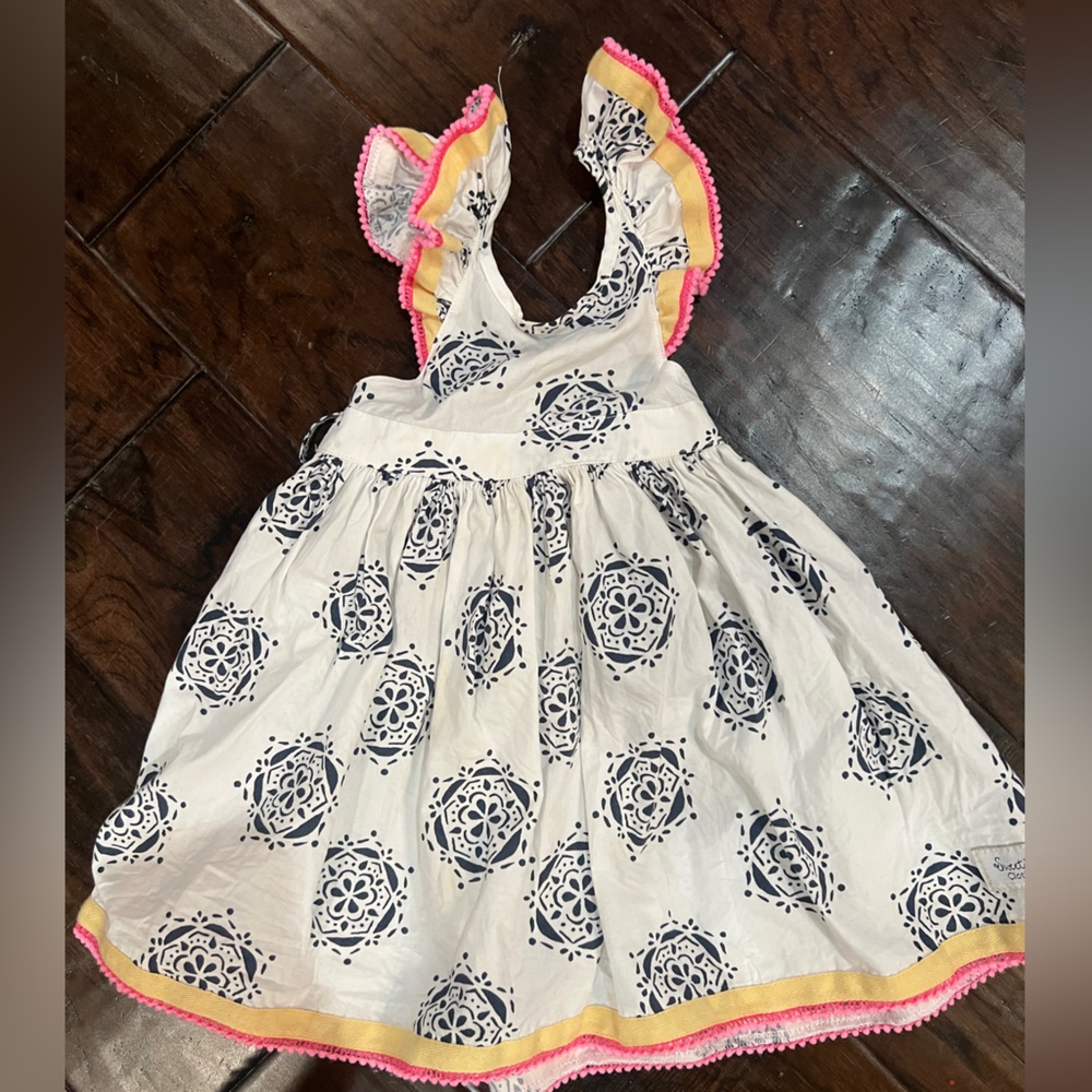 White and navy Patterned Dress with Pink Trim
